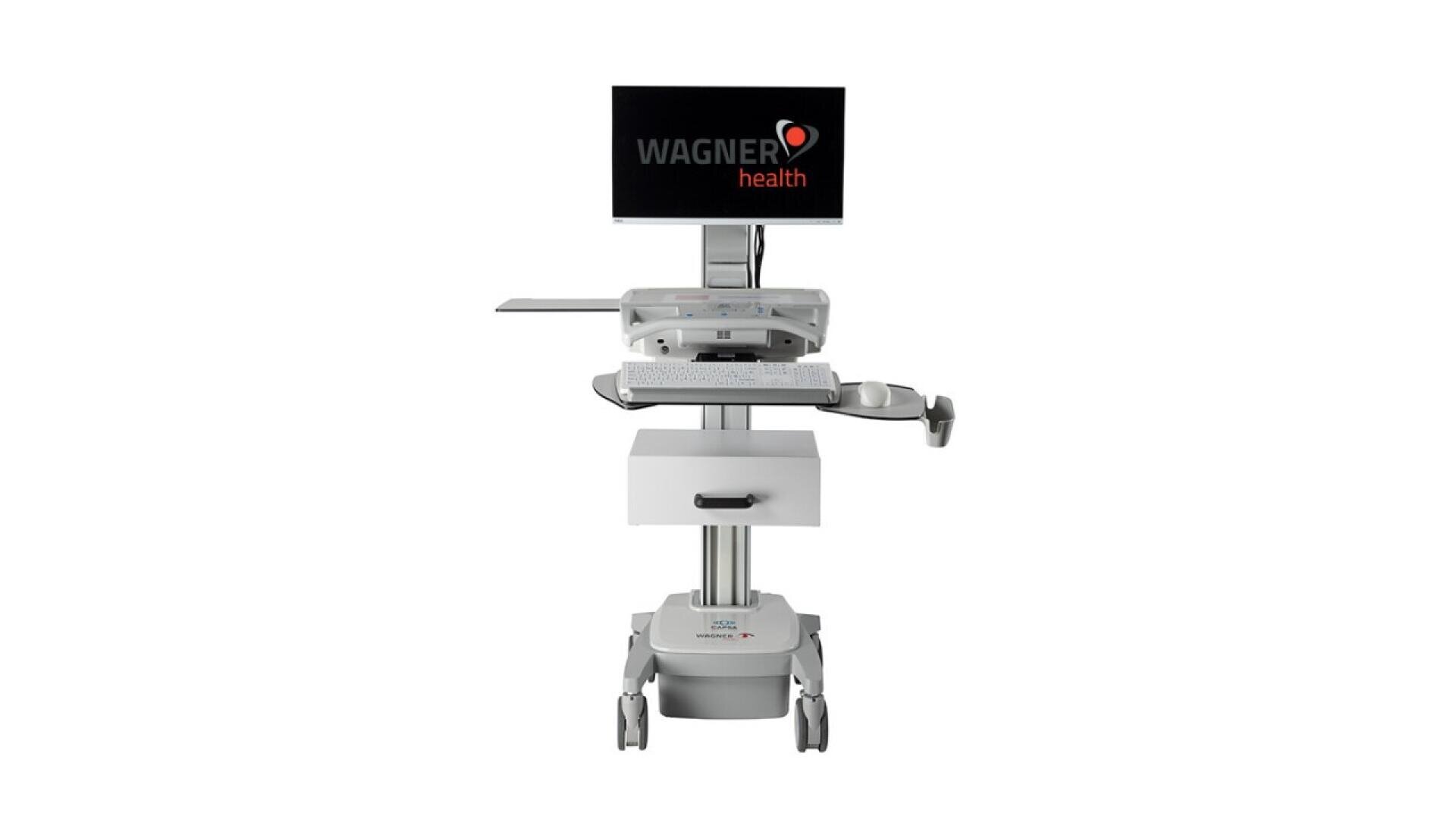 Poste de travail informatique médical sur roues avec un écran affichant WAGNER health, un clavier, un tiroir et des plateaux pour le matériel, conçu pour être utilisé dans les établissements de soins de santé.